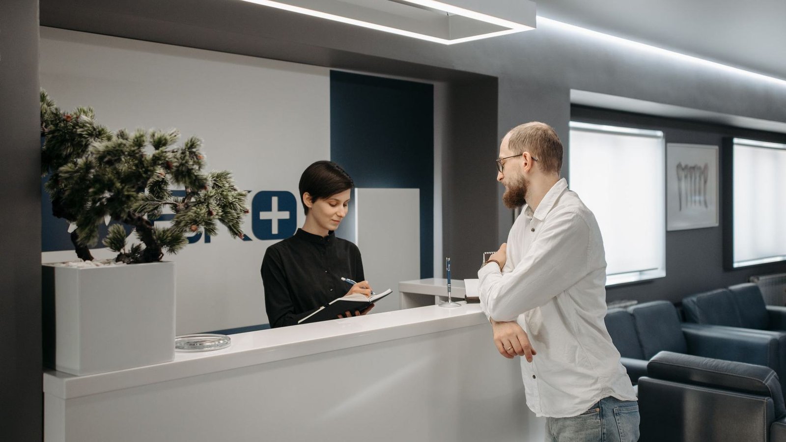 Reception desk at Family Care Clinic, bright and welcoming
