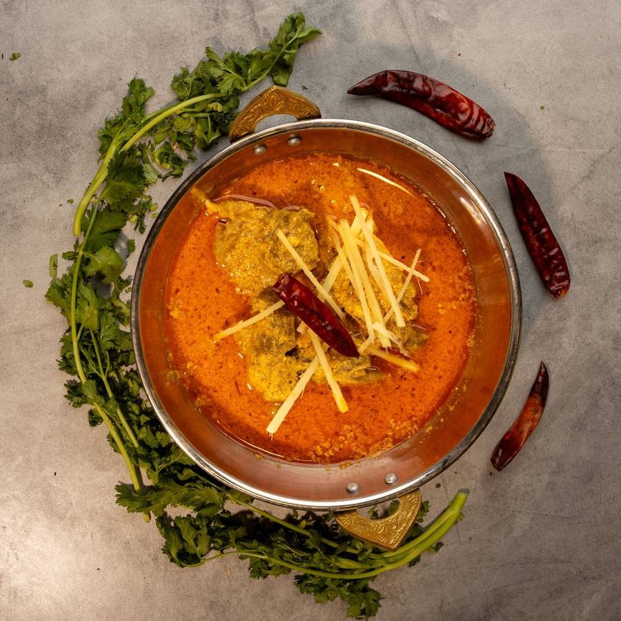 Slow cooked mutton in rich gravy with ginger